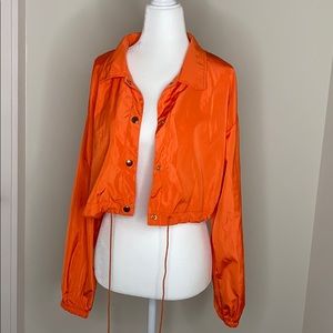 Orange windbreaker